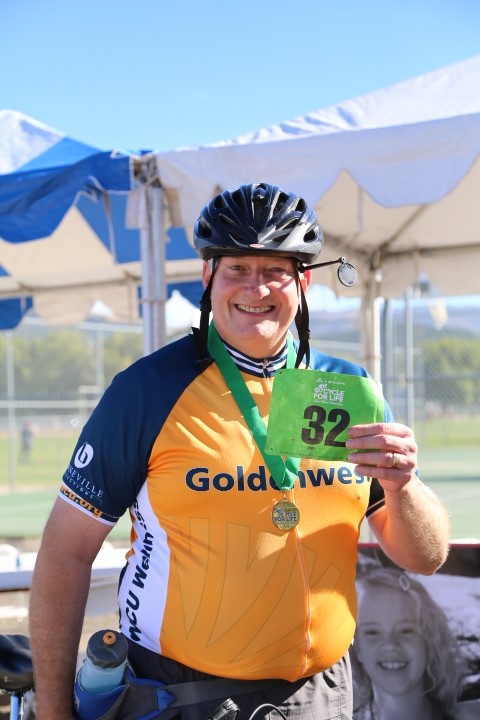 Goldenwest Team Member riding in Cycle For Life