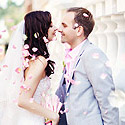 A young couple about to kiss when getting married