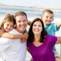 A happy family on vacation at the beach