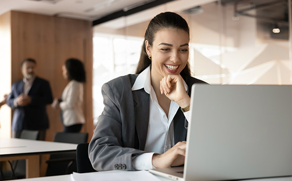 A group of business professionals holding hands as a united team