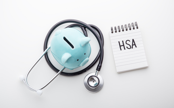 A blue piggy bank and a stethoscope.