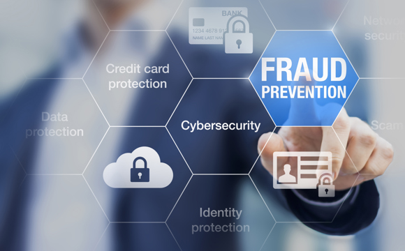 A man clicking a Fraud Prevention button.